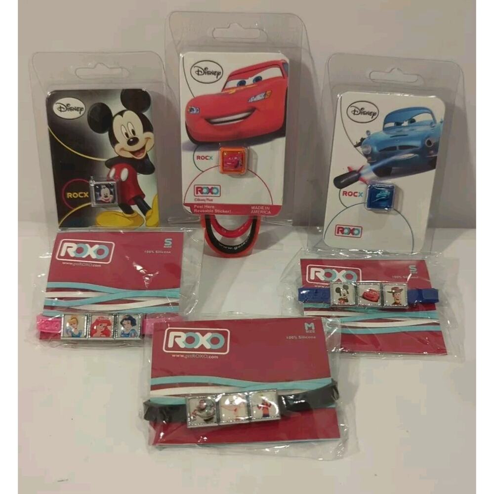 Disney Pixar Roxo Bracelet And Charms Lot